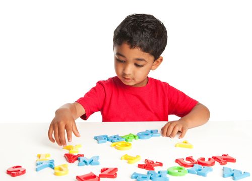Preschool Child playing with toy