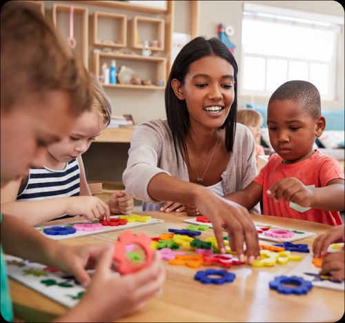 Teacher teaching children